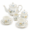 Service à thé 2 personnes en porcelaine blanche à fleurs bleues et jaunes finition dorée